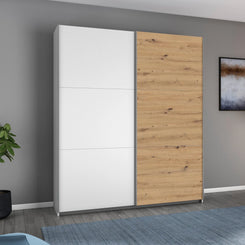 Rauch Aurelia White & Artisan Oak Sliding Door Wardrobe styled in a modern bedroom
