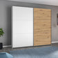Rauch Aurelia White & Artisan Oak Sliding Door Wardrobe styled in a beautiful room