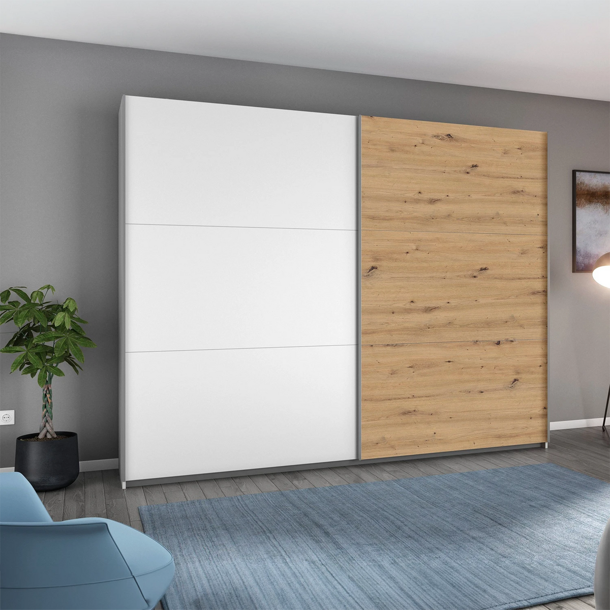 Rauch Aurelia White & Artisan Oak Sliding Door Wardrobe styled in a modern bedroom