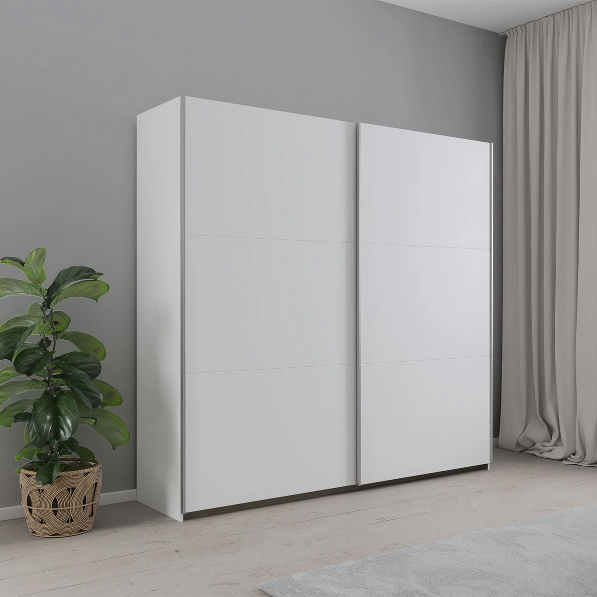 Rauch Aurelia White Sliding Door Wardrobe styled in a modern bedroom