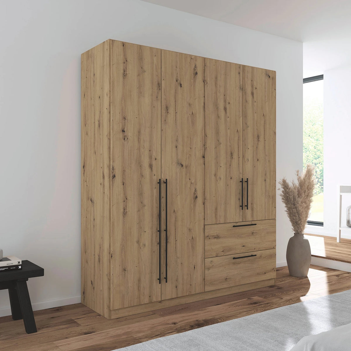 Rauch Avola 4 Door, 2 Drawers Combi Wardrobe 181cm in Oak styled in a modern bedroom
