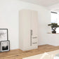 Rauch Avola 2 Door, 2 Drawers Combi Wardrobe 91cm in Champagne styled in a bedroom