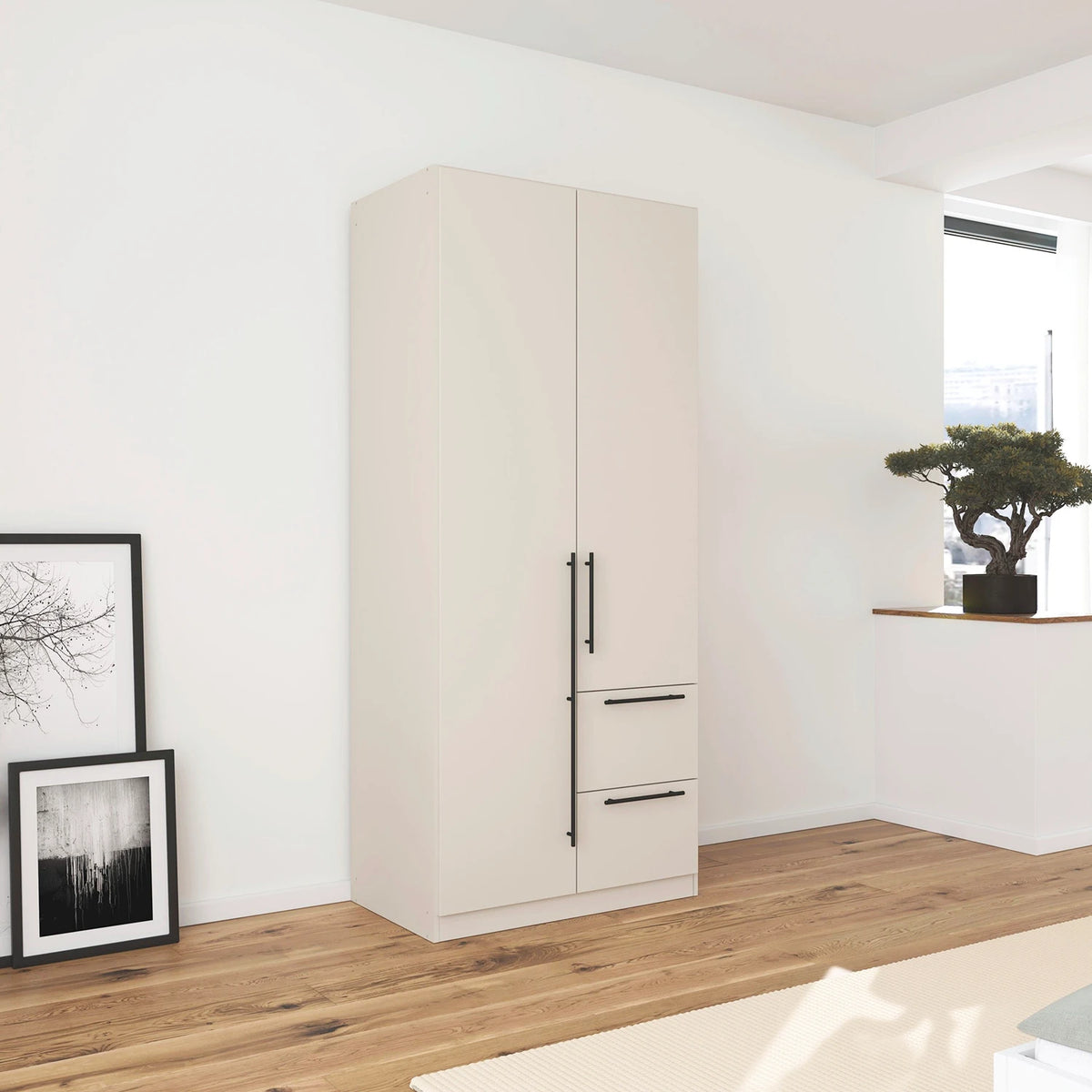 Rauch Avola 2 Door, 2 Drawers Combi Wardrobe 91cm in Champagne styled in a bedroom