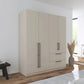Rauch Avola 4 Door, 2 Drawers Combi Wardrobe 181cm in Champagne styled in a modern bedroom