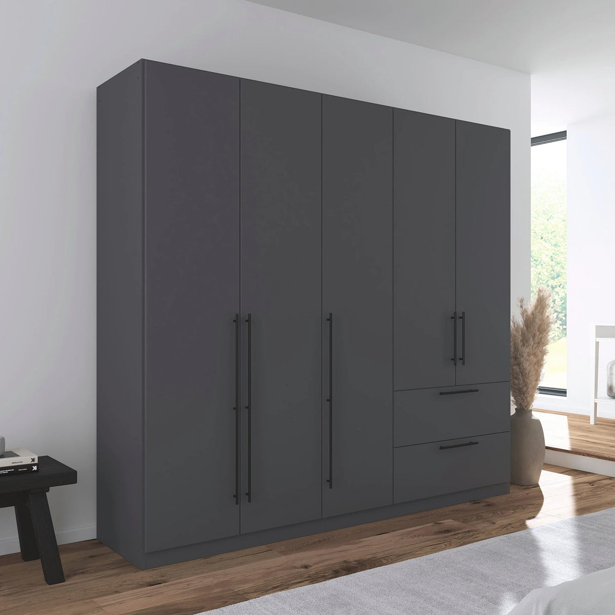 Rauch Avola 5 Door, 2 Drawers Combi Wardrobe 226cm in Metallic Grey styled in a modern bedroom