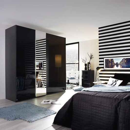Cairns Graphite Sliding Wardrobe with Basalt Glass Front, styled in a bedroom