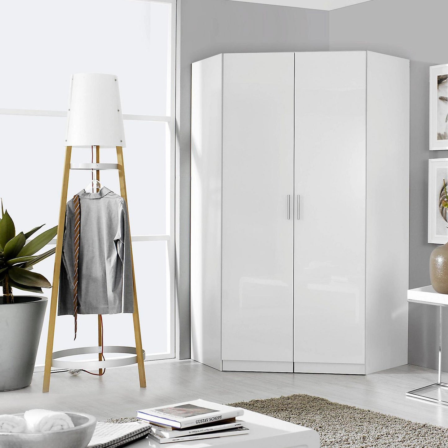 Rauch Celle White High Gloss 2 Door Corner Wardrobe - Styled in a Bedroom