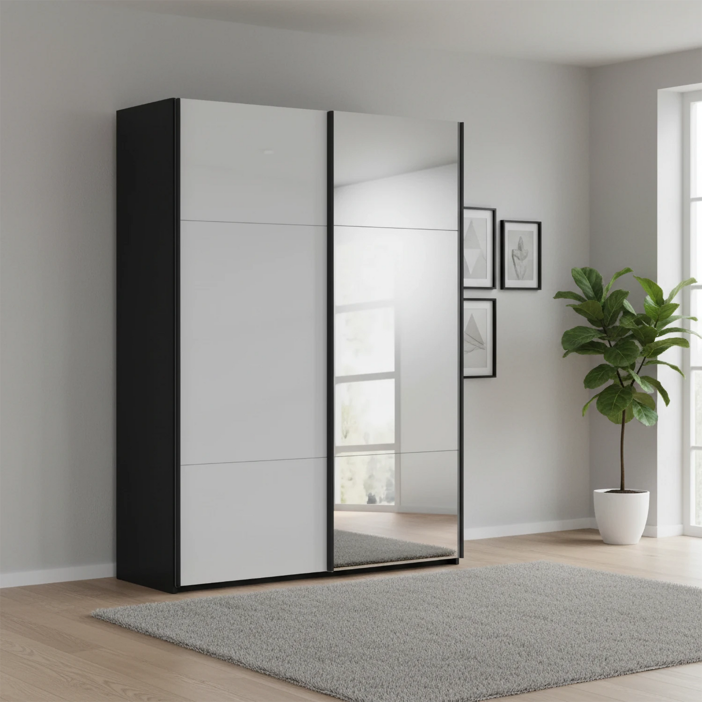A modern Rauch Contido wardrobe with two sliding doors, one Silk Grey Glass and one mirrored, and Has Matching Black Door Handle Bars set in a minimalist room with a gray rug, potted plant, and light wood flooring.