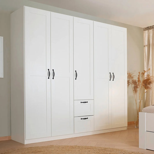 Rauch Cottage 226cm Wide 5 Door Wardrobe with Drawers - Styled in a Bedroom