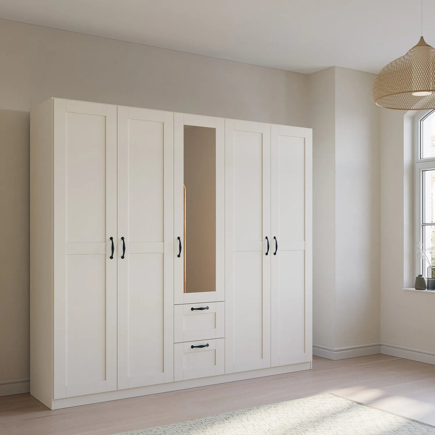 Rauch Cottage 226cm Wide 5 Door Wardrobe with Drawers & Mirror - Styled in a Bedroom
