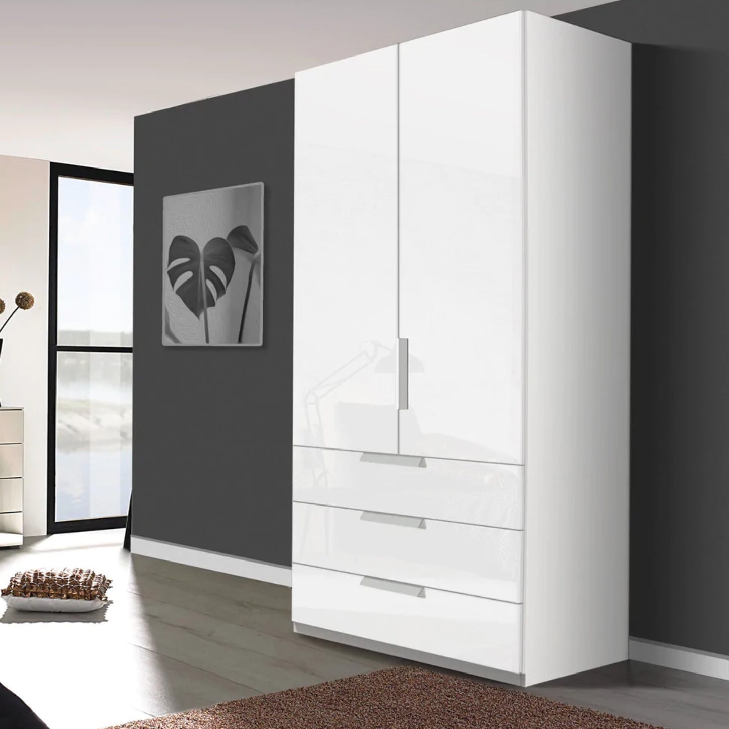 Rauch Crystal 2 Door Colour Glass Wardrobe with Drawers in White -  Styled in a Bedroom