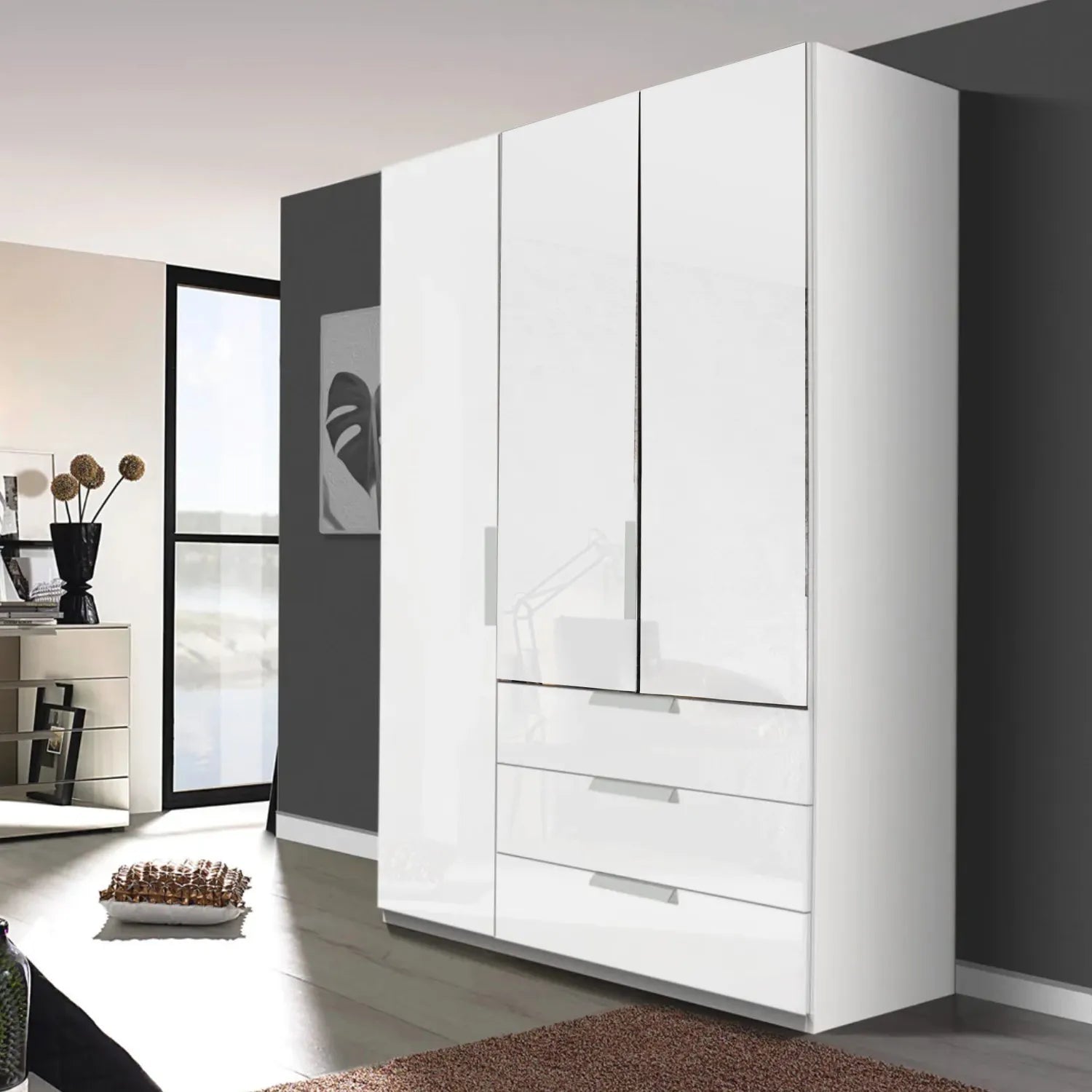 Rauch Crystal 3 Door Colour Glass Wardrobe with Drawers in White - Styled in a Bedroom
