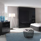 Rauch Crystal 4 Door Colour Glass Wardrobe with Drawers in graphite styled in a bedroom