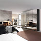 Rauch Miramar Graphite 5 Door Full Mirror Wardrobe with Drawer - Styled in a Bedroom