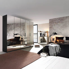 Rauch Miramar Graphite 5 Door Full Mirror Wardrobe with Drawer - Styled in a Bedroom