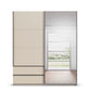 A modern Rauch Elara two Door Champagne Sliding Door Wardrobe with Drawers under left door and Mirror on the right door 