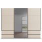 Rauch Orange Elara three door Sliding Wardrobe with Drawers & Grey Mirror on the Middle Door in Champagne