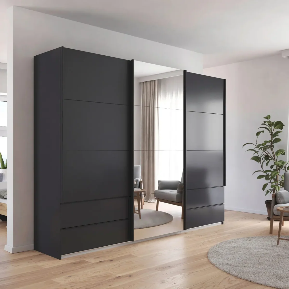 Modern Rauch Elara Metallic Grey three door Sliding Wardrobe With Exterior Drawers, Middle Mirror Door and Matching  Handle Bars