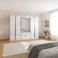 Rauch Essena six Door Hinged Wardrobe in White Glass with Mirror front and 2 Drawers in the Middle