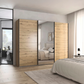 Rauch Forms three door sliding wardrobe in Artisan Oak with a mirrored centre door and graphite bar handles
