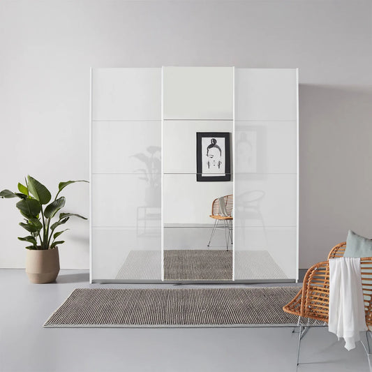 Rauch Forms White High Gloss 3 Door Sliding Wardrobe with Mirror - Styled in a Bedroom