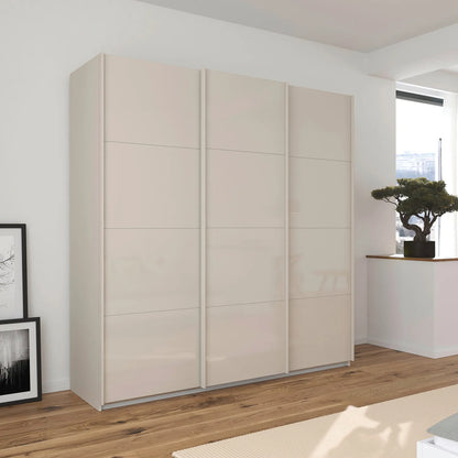 German-made Rauch Forms 3 door sliding wardrobe with champagne tempered glass fronts. 203cm or 271cm wide, two heights. Free delivery, 10-year guarantee.
