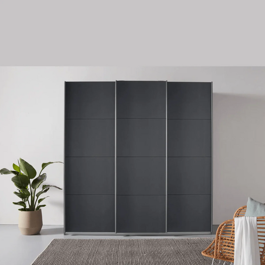 Rauch Forms Metallic Grey Decor 3 Door Sliding Wardrobe - Styled in a Bedroom