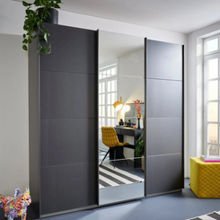 Rauch Forms Metallic Grey & Mirror 3 Door Sliding Wardrobe - Styled in a Bedroom