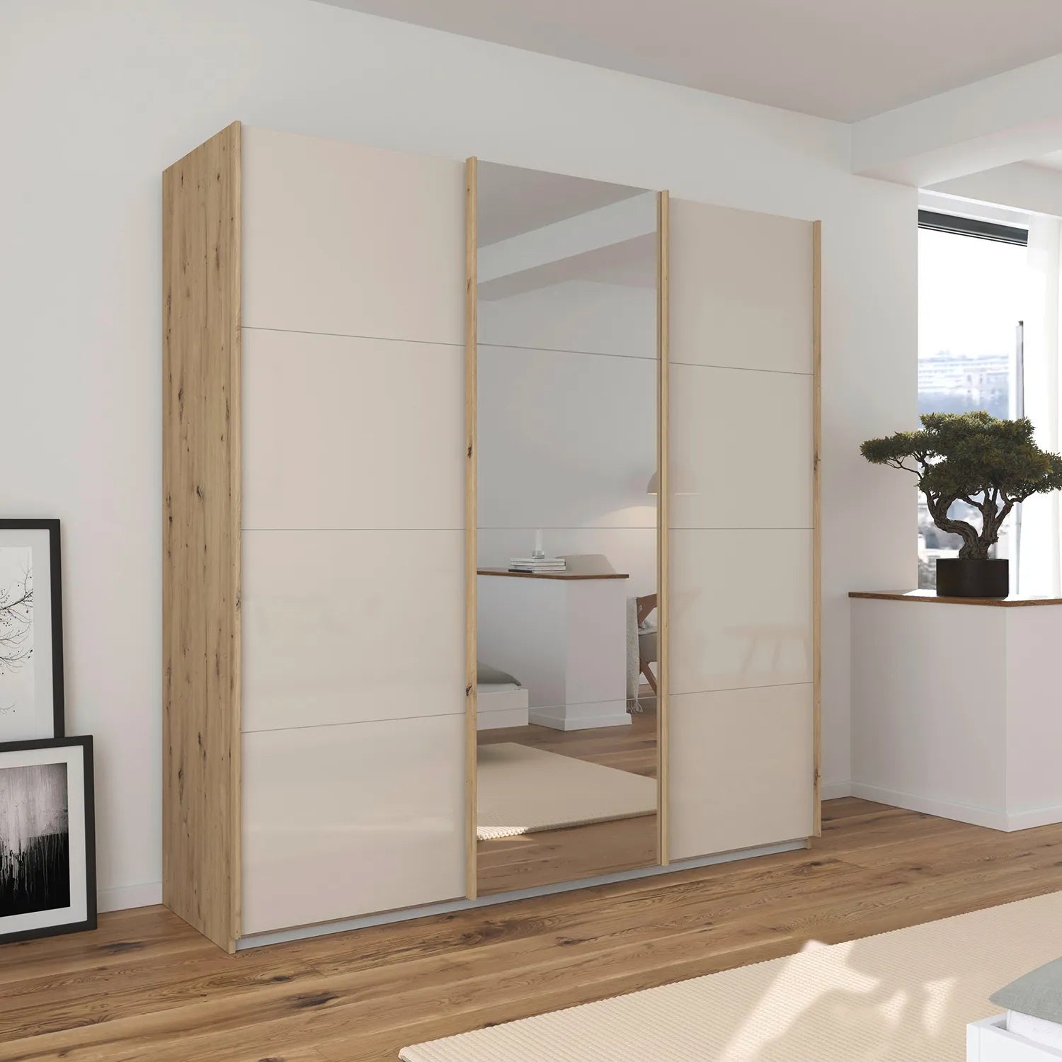 Rauch Forms Oak & Champagne Glass 3 Door Sliding Wardrobe - Styled in a Room
