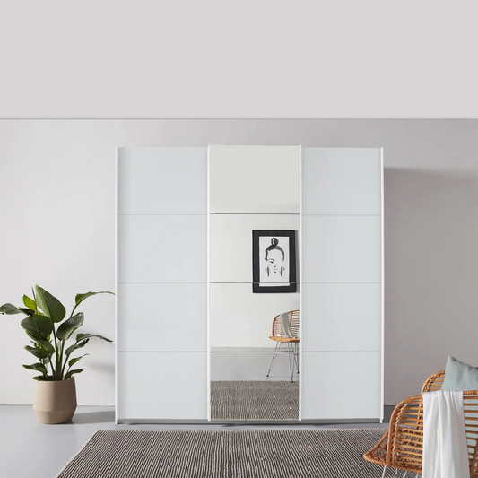 Rauch Forms White Decor 3 Door Sliding Wardrobe with Mirror - Styled in a Bedroom