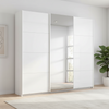 Rauch Forms three door sliding wardrobe with white tempered glass fronts and a mirrored centre door
