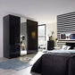Rauch Graphite Perth Sliding Door Wardrobe - Styled in a Bedroom
