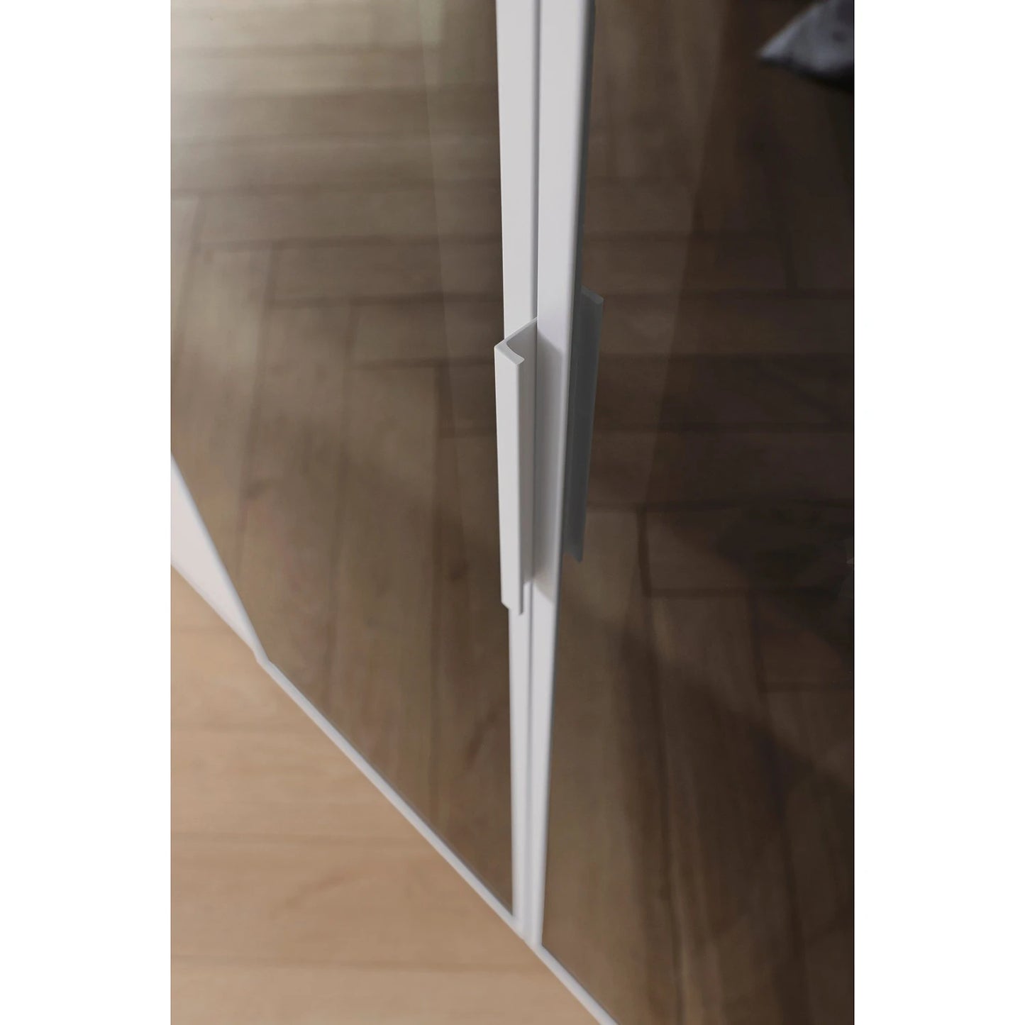 Close up of short handle on Glass door of Rauch Kacey 151cm 3 door wardrobe with dark grey glass centre door
