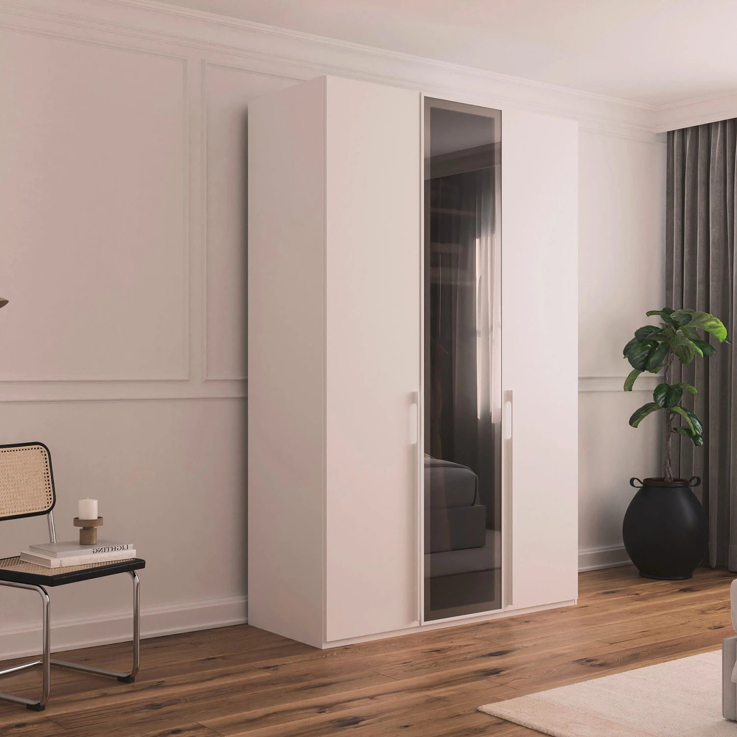 Rauch Kacey White 151cm 3 door wardrobe with dark grey glass centre door Styled in a modern room