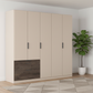 Kodi champagne 226cm wardrobe showing three full-height doors beside the drawer unit