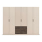 A modern 6-door wardrobe with a light beige finish and a dark brown wood-grain drawer unit at the bottom center, shown on a solid white background.