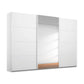 A modern Rauch Kulmbach Forms white sliding wardrobe door set with two doors open to reveal a mirrored back panel and a glimpse of a wooden floor, shown against a plain white background.