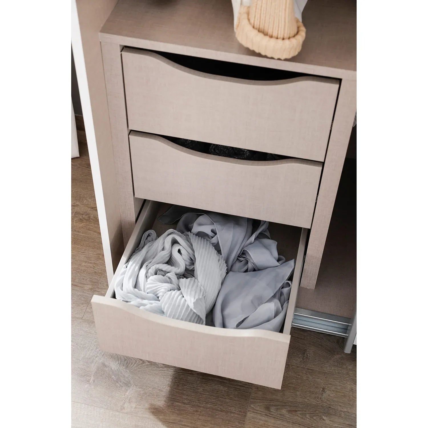 Rauch Lema 4 Door Sliding Corner Wardrobe - White High Gloss - Drawers Closeup view Styled in a Bedroom