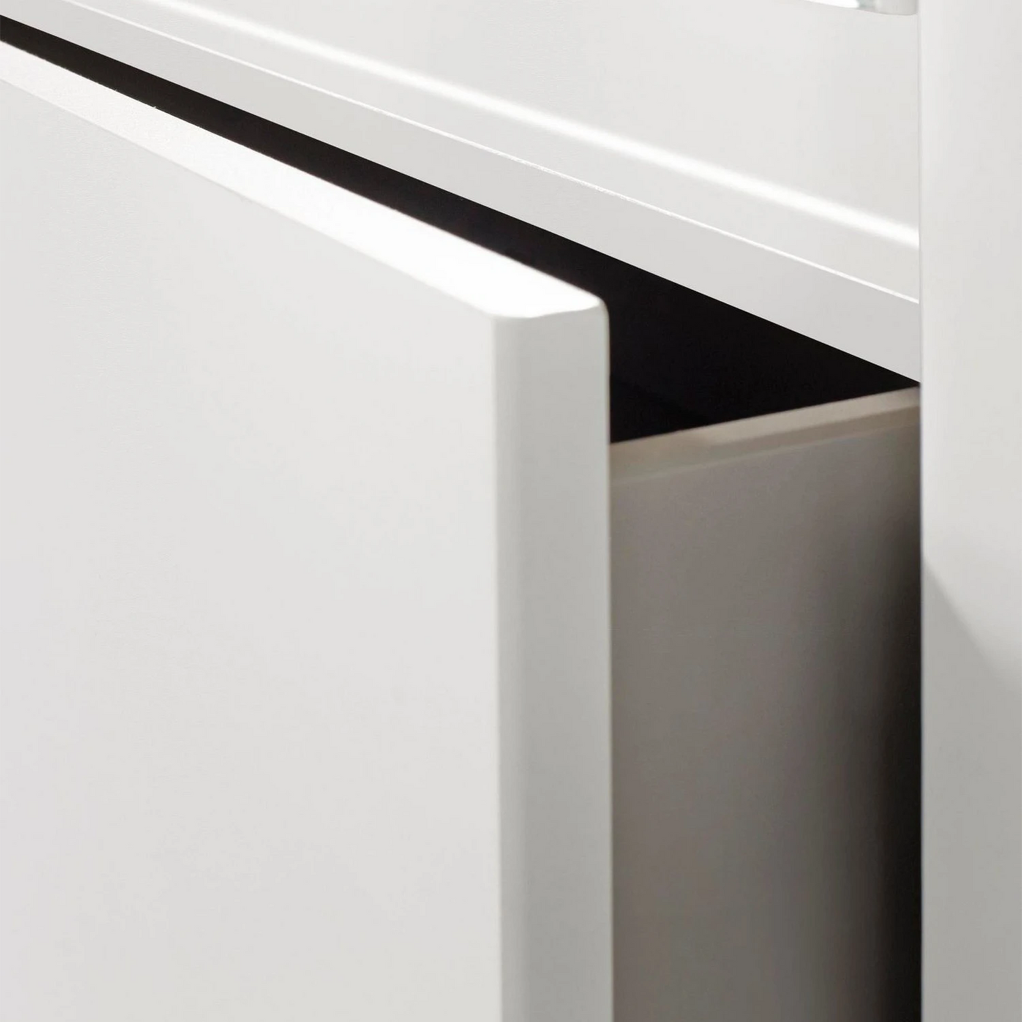 Close-up of a white leon cabinet with drawer