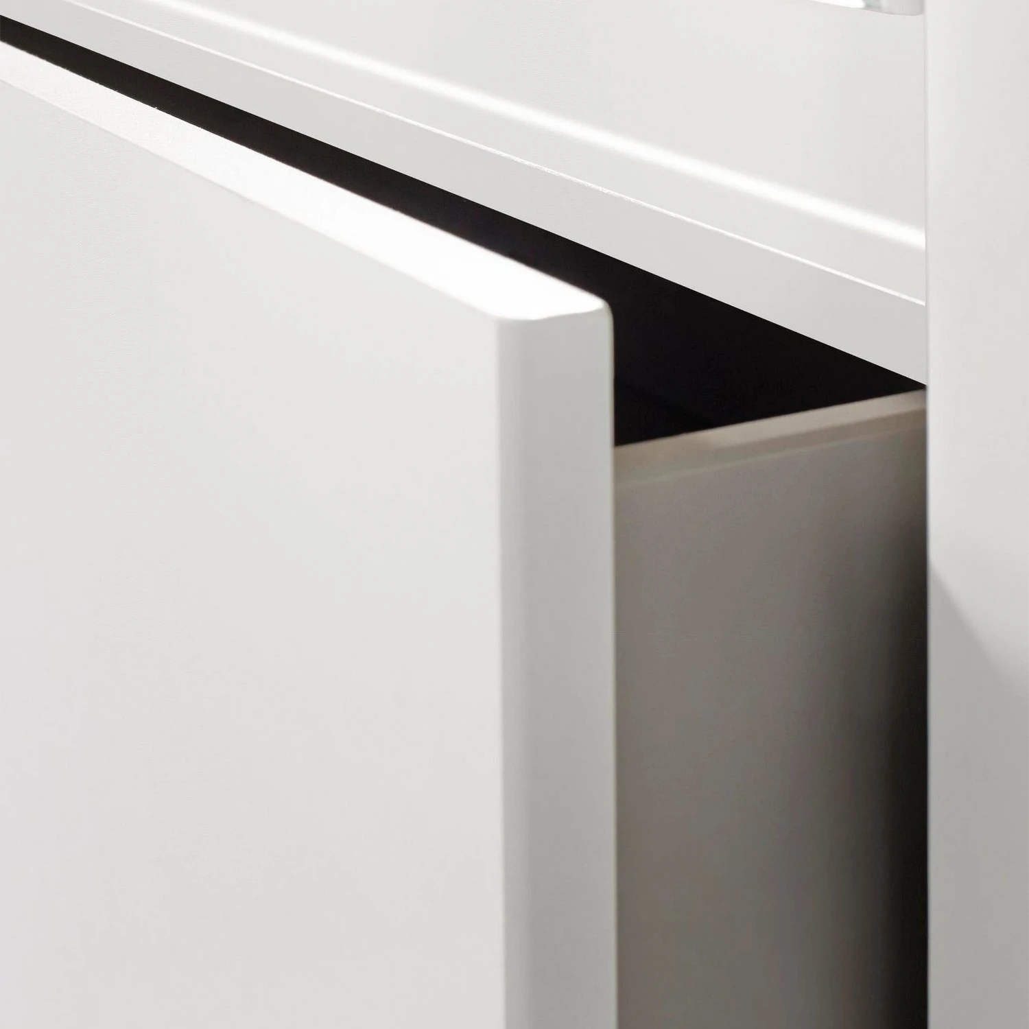 Close-up of a white leon cabinet with drawer