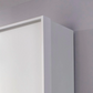 Rauch Leon 4 door mirrored wardrobe with drawers with Passepartout Light Frame close up