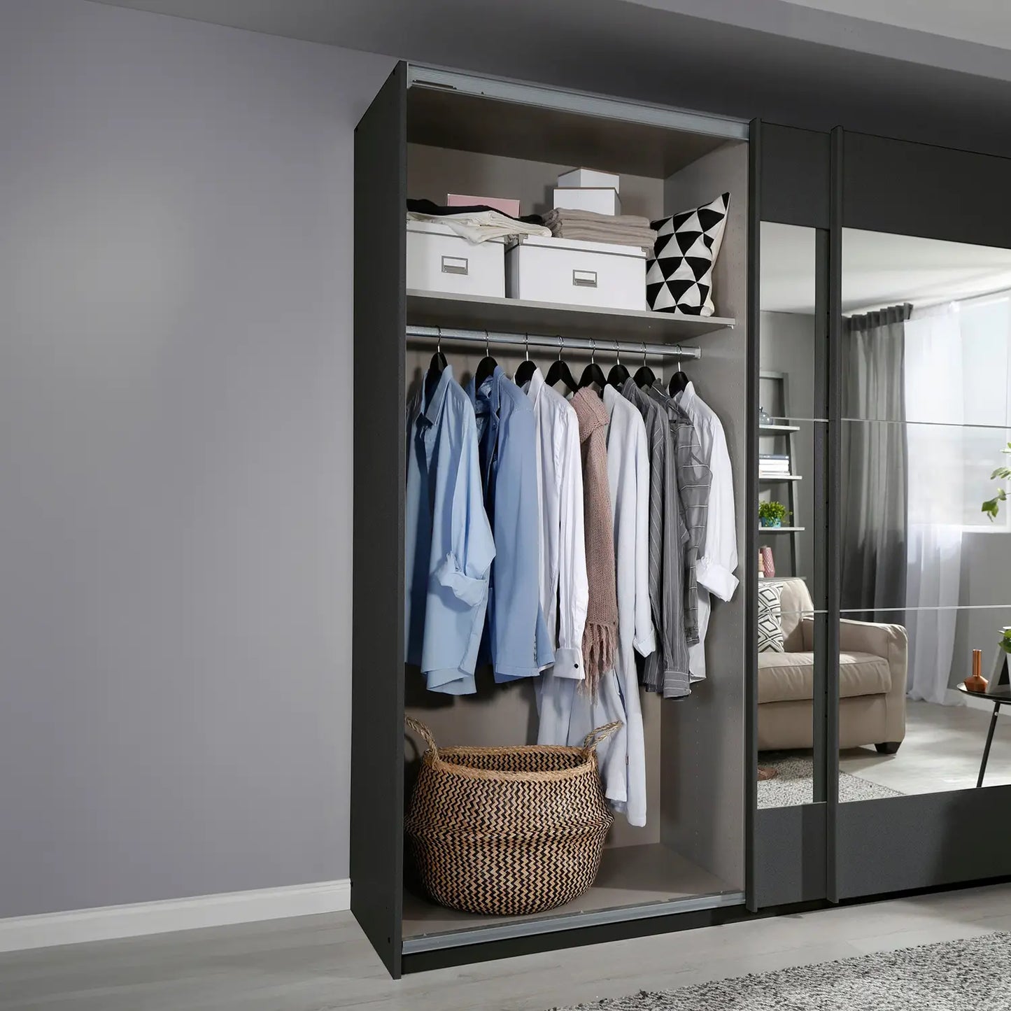 Mali 181cm Graphite & Mirror Sliding Door Wardrobe - Interior view Styled in a Living Room