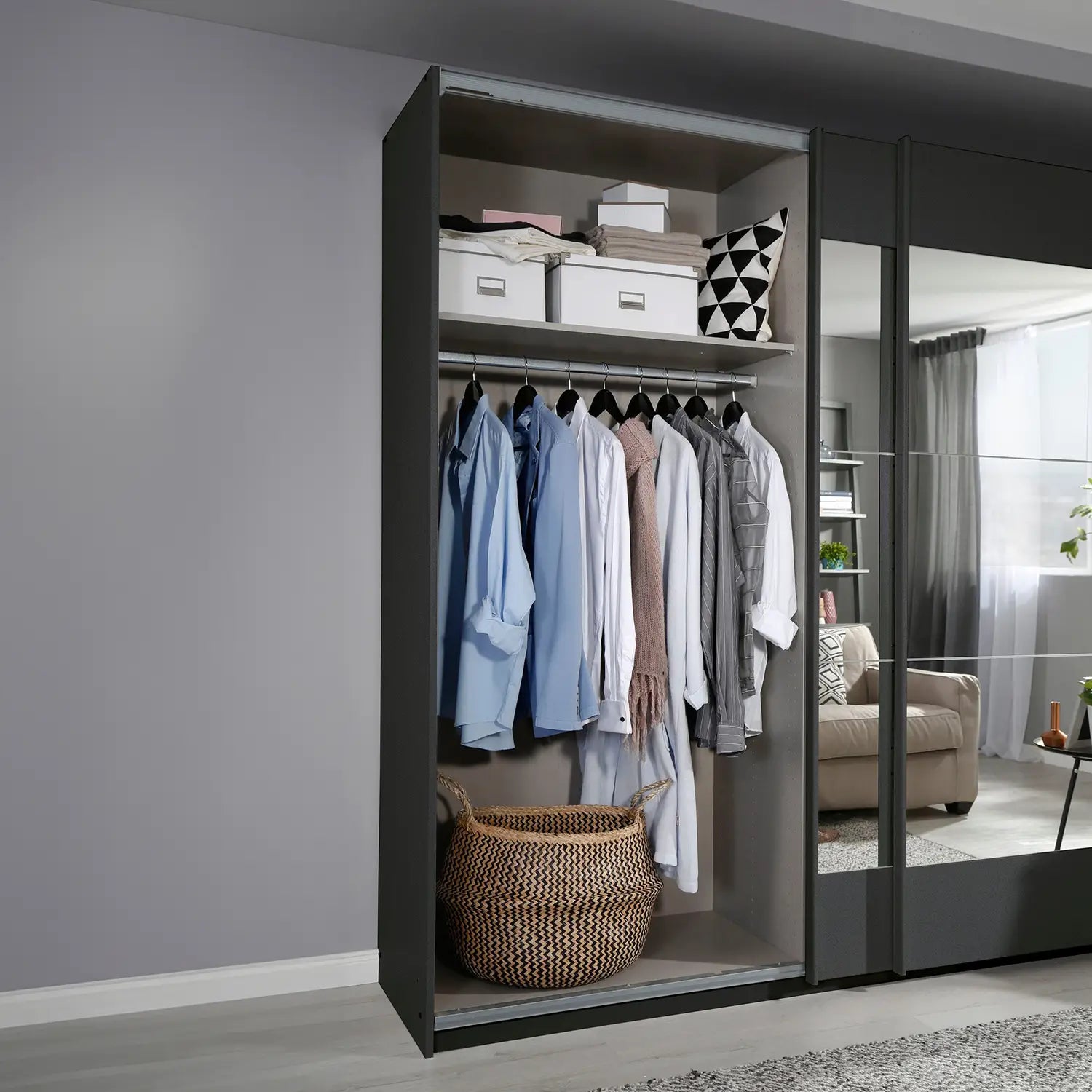 Mali 181cm Graphite & Mirror Sliding Door Wardrobe - Interior view Styled in a Living Room