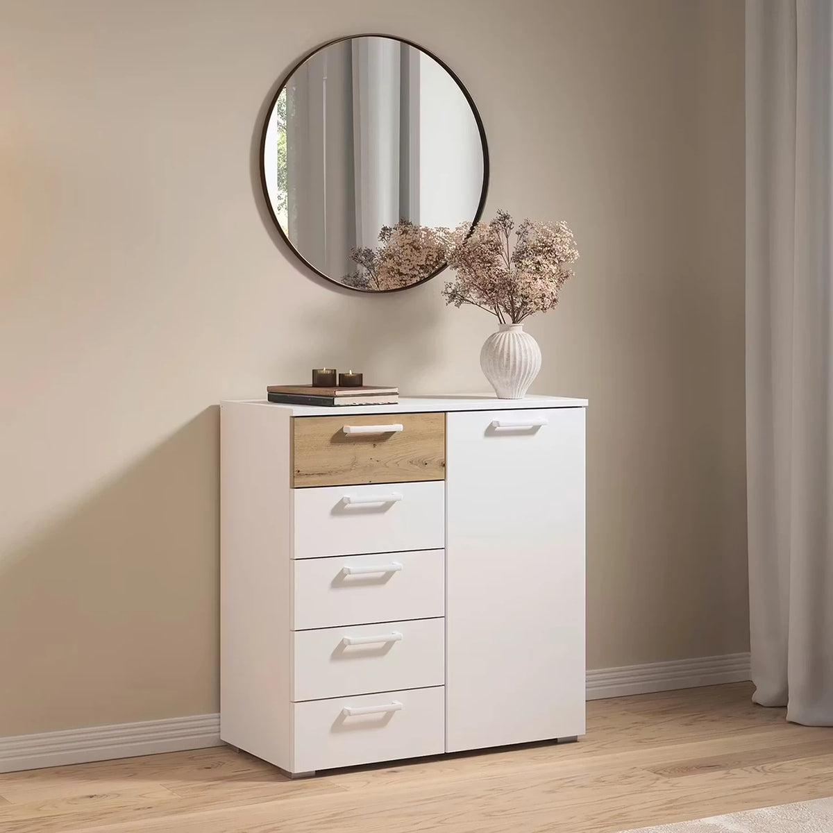 Rauch Miro 1 Door 5 Drawers Bedside Table in Alpine White & Artisan Oak styled in a modern bedroom