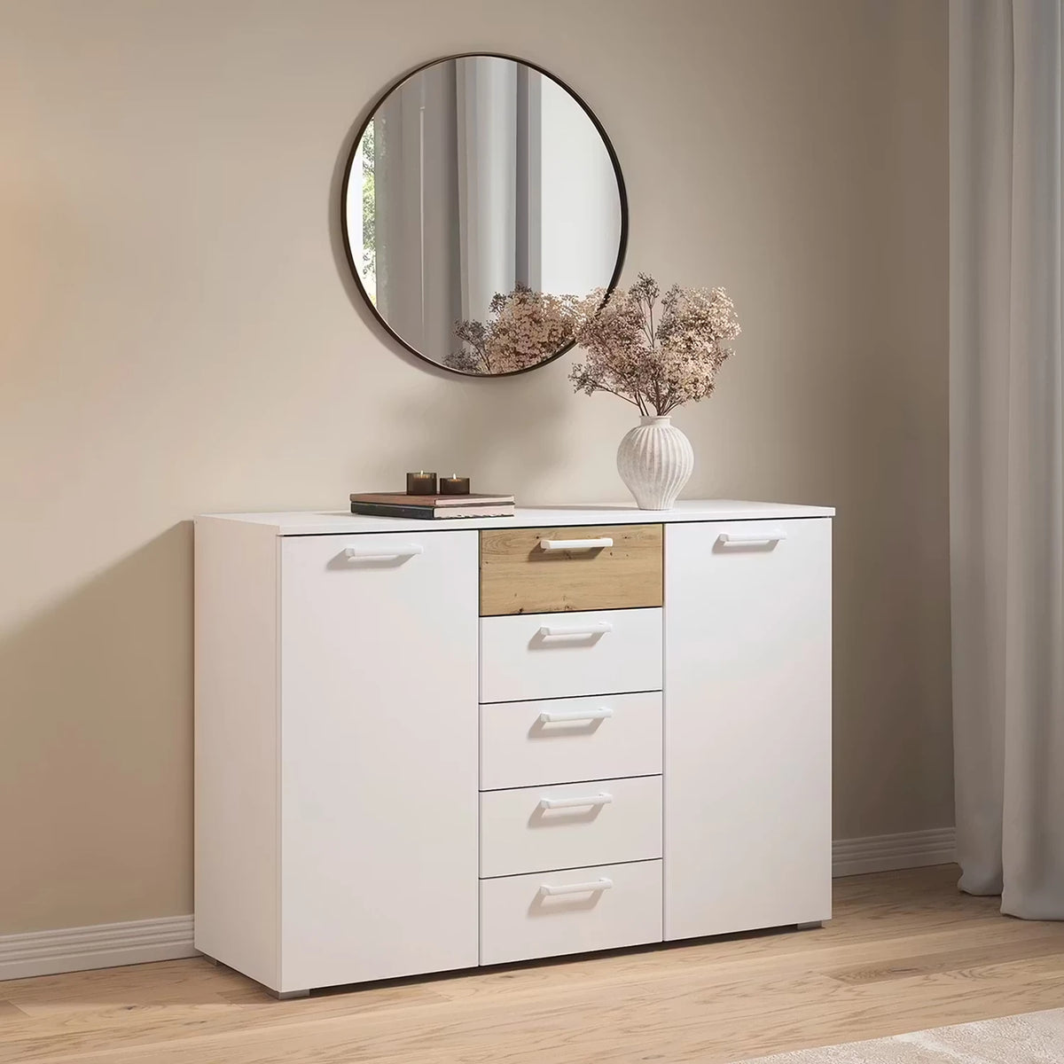 Rauch Miro 2 Door 5 Drawers Bedside Table in Alpine White 7 Artisan Oak styled in a modern bedroom