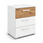 Rauch Miro 3 Drawer Bedside Table in Alpine White & Artisan Oak styled in a modern bedroom
