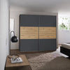 Rauch Miro 2 Door Sliding Wardrobe in Metallic Grey & Artisan Oak styled in a modern bedroom