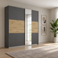 Rauch Miro 2 Door Sliding Wardrobe With Mirror in Metallic Grey & Artisan Oak styled in a modern bedroom