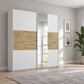 Rauch Miro 2 Door Sliding Wardrobe With Mirror in Alpine White & Artisan Oak styled in a modern bedroom