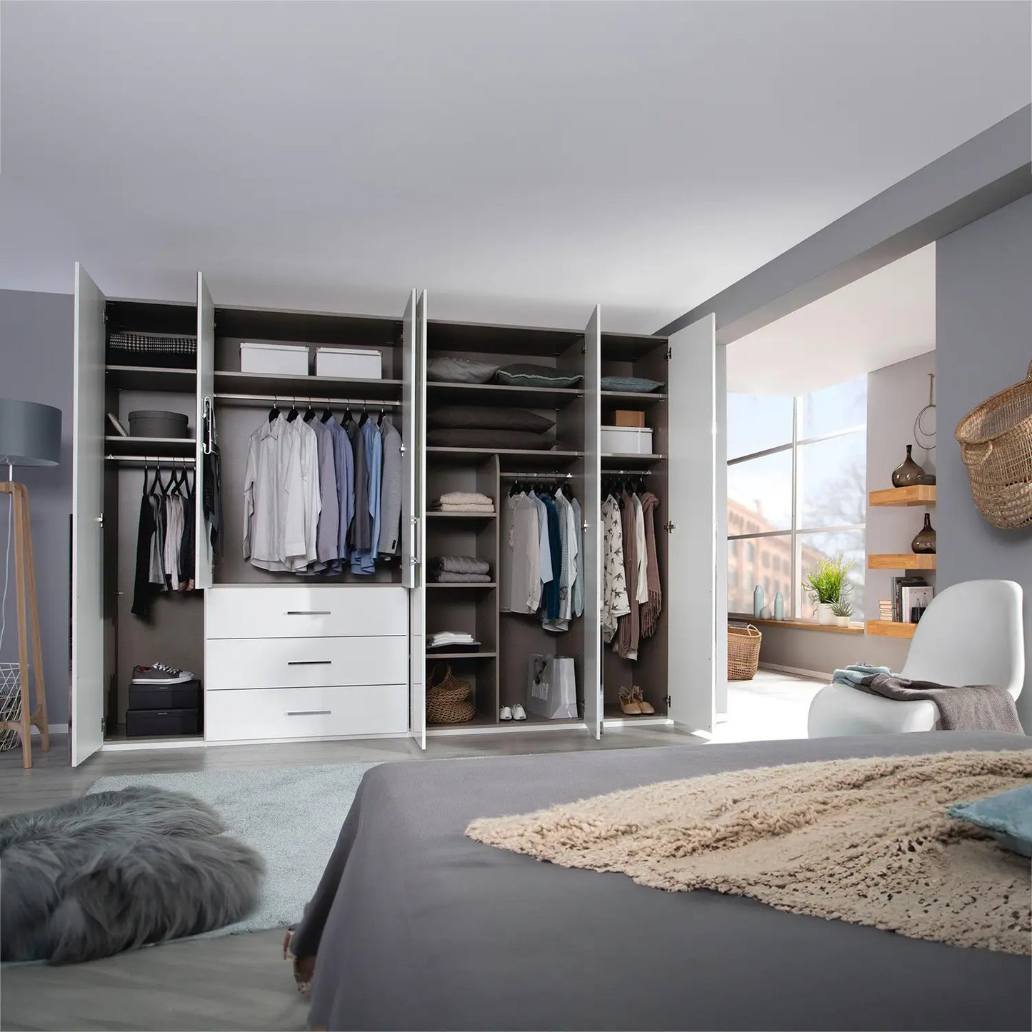 Rauch Montclar White High Gloss 6 Door Wardrobe with Drawers & Mirror - Interior view Styled in a Bedroom